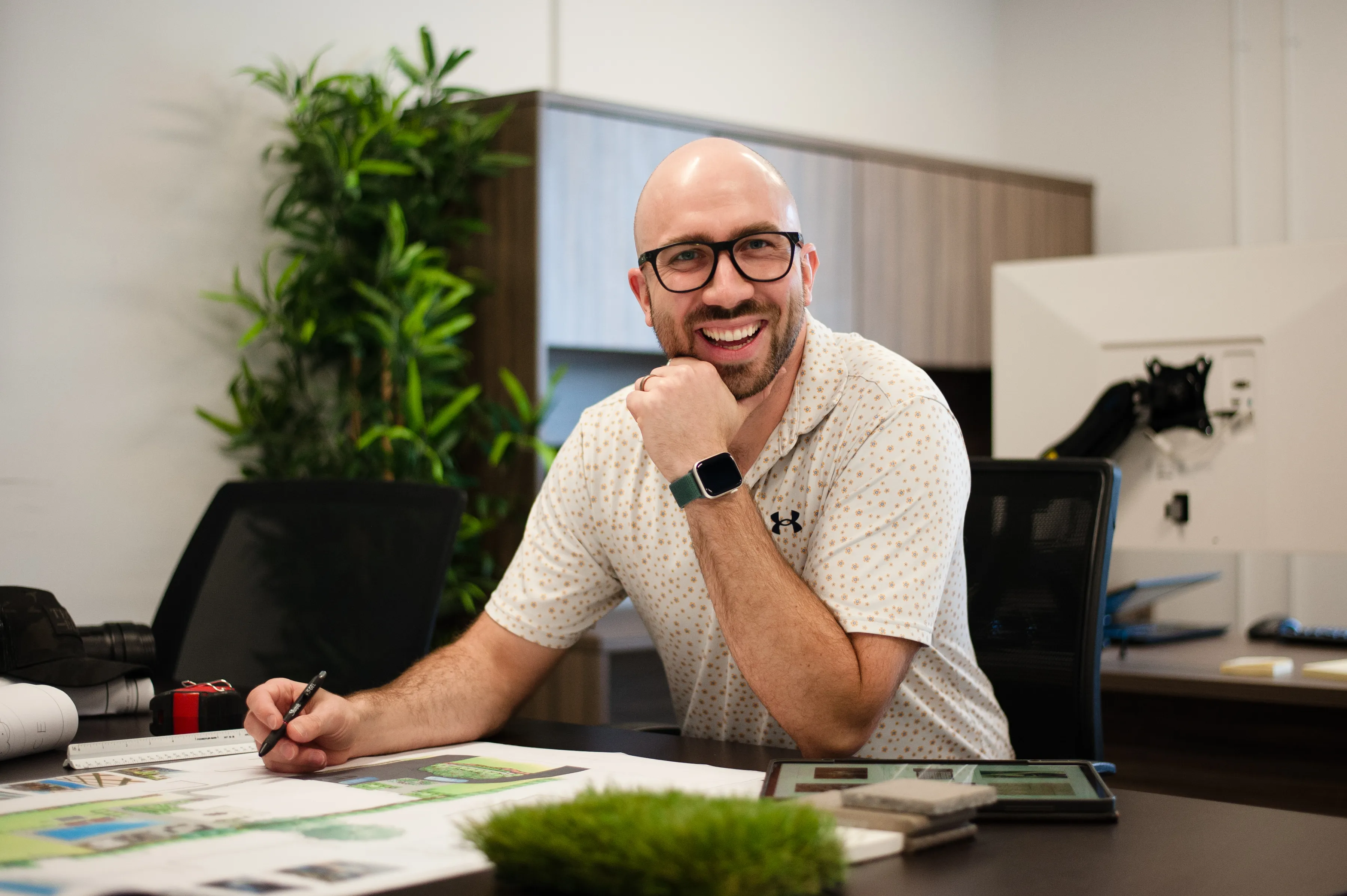 Blaise Mombourquette, Design Principal, working at his desk