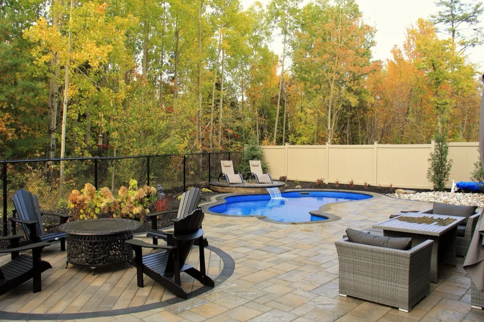 Completed pool and patio in autumn
