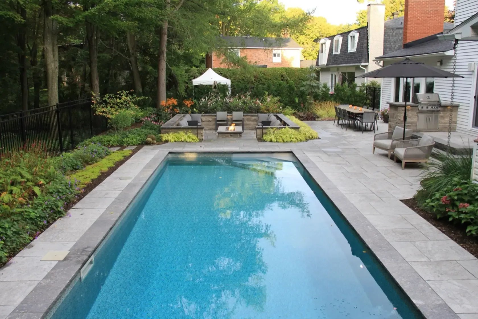 Chesswood outdoor kitchen and natural-stone terrace